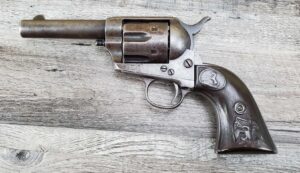 Original Colt Sheriff's Model Single Action Army revolver in .45 caliber, with a 4-inch barrel and an even gray patina, accompanied by its Colt factory letter.