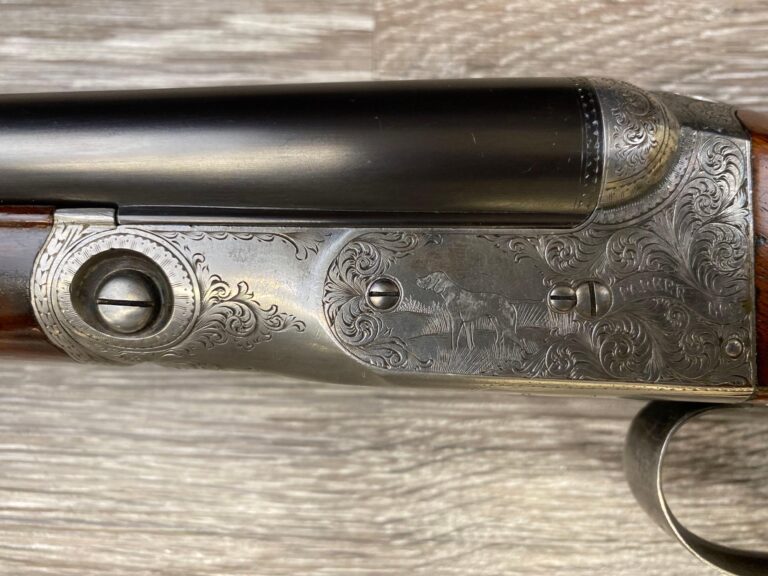 Rare Parker Brothers DHE 28 gauge double barrel shotgun with a checkered stock, engraved receiver, and Titanic barrels.