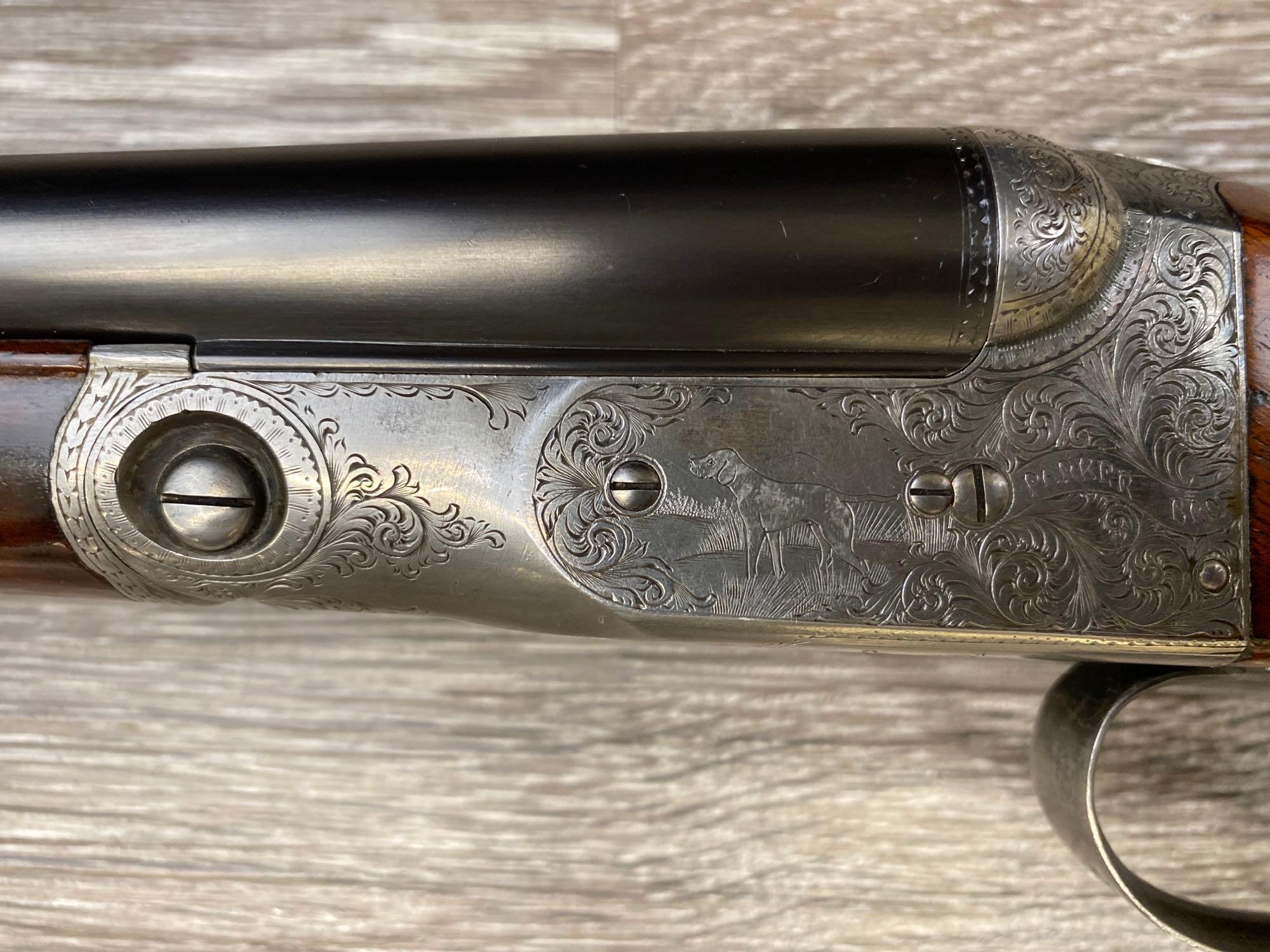 Rare Parker Brothers DHE 28 gauge double barrel shotgun with a checkered stock, engraved receiver, and Titanic barrels.