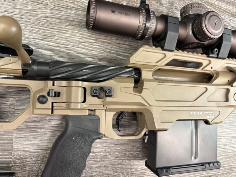 CADEX DEFENCE CDX-40 SHADOW precision bolt action rifle in .375 CheyTac with a tan Cerakote finish, shown with a Vortex Razor HD scope and a padded case.